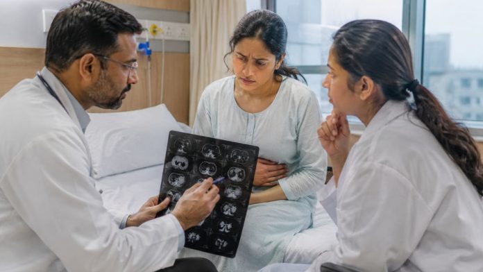 Doctor explaining scan to patient
