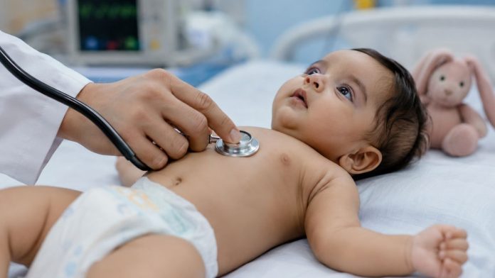 Gentle baby check-up in clinic