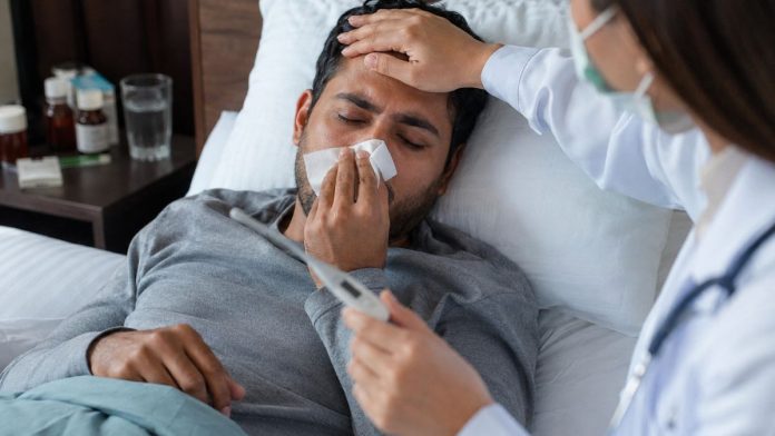 Patient being examined in hospital room